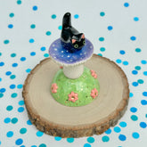Black Itty Bitty with a Blue & Purple Mushroom